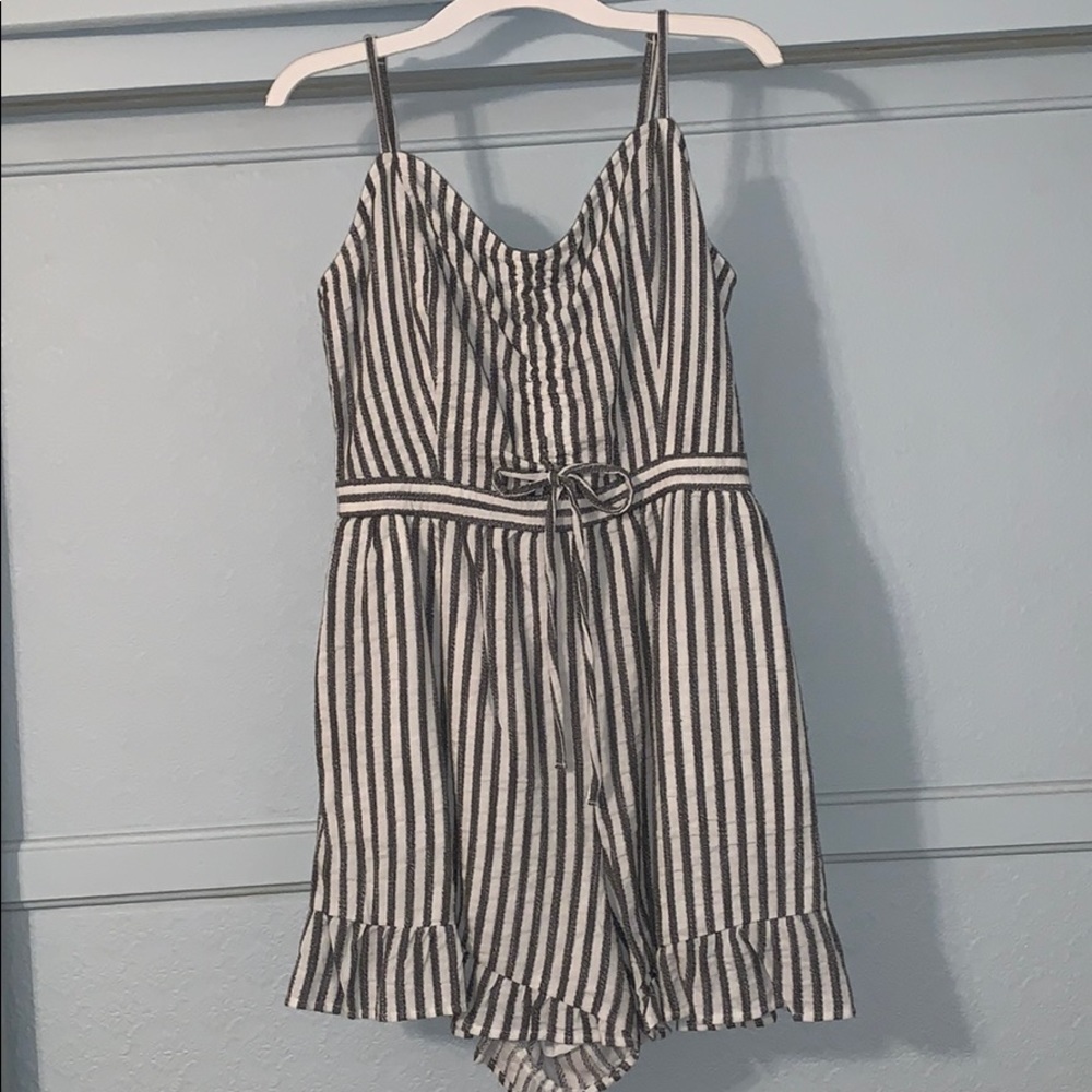 Striped romper with ruffles